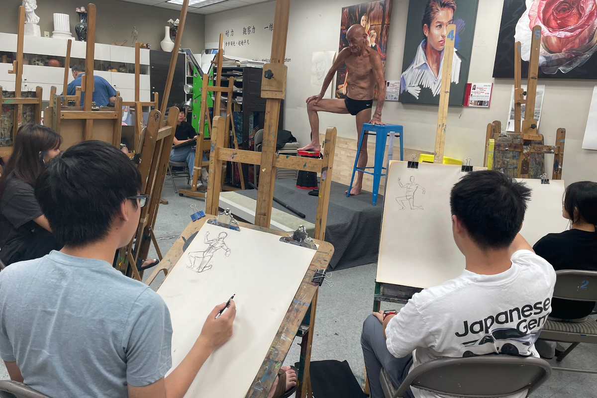 Finished figure drawing studies by students